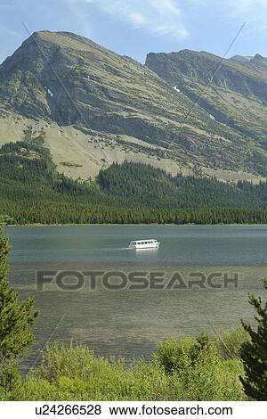 Glacier National Park, MT, Montana, Rocky Mountains, Many Glacier Region, Swiftcurrent Lake View Large Photo Image Stock Photo - Glacier National Park, MT, Montana, Rocky Mountains, Many Glacier Region, Swiftcurrent Lake. Fotosearch