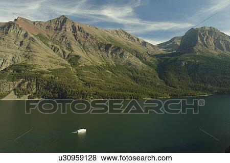 Glacier National Park, MT, Montana, Rocky Mountains, Going to the Sun Road, St. Mary Lake, excursion boat View Large Photo Image Stock Photo - Glacier National Park, MT, Montana, Rocky Mountains, Going to the Sun Road, St. Mary Lake, excursion boat. Fotosearch