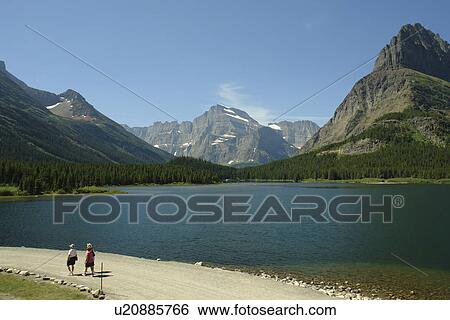Glacier National Park, MT, Montana, Rocky Mountains, Many Glacier Region, Many Glacier Hotel, Swiftcurrent Lake View Large Photo Image Stock Photograph - Glacier National Park, MT, Montana, Rocky Mountains, Many Glacier Region, Many Glacier Hotel, Swiftcurrent Lake. Fotosearch