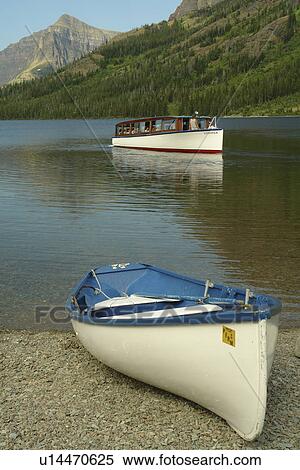 Stock Photography -  Glacier National Park, MT, Montana, Rocky Mountains, Two Medicine Lake, excursion boat. Fotosearch