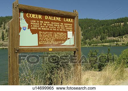 Stock Photography -  Harrison, ID, Idaho, Lake Coeur D' Alene Scenic Byway, Coeur D'Alene Lake, interpretive sign, historical marker. Fotosearch