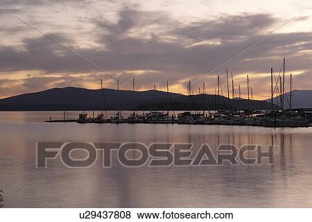 Stock Photo -  Hope, ID, Idaho, Pend Oreille Lake, Pend Oreille National Scenic Byway, sunset. Fotosearch