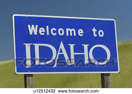 Stock Image -  ID, Idaho, WA, Washington, Welcome to Idaho, road sign, border. Fotosearch