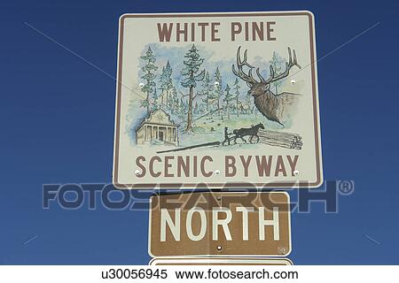 Stock Photography -  ID, Idaho, White Pine Scenic Byway, road sign. Fotosearch