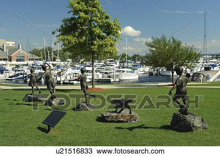 Ludington, MI, Michigan, Lake Michigan, waterfront, municipal marina, park, Follow the Leader sculpture View Large Photo Image Stock Image - Ludington, MI, Michigan, Lake Michigan, waterfront, municipal marina, park, Follow the Leader sculpture. Fotosearch