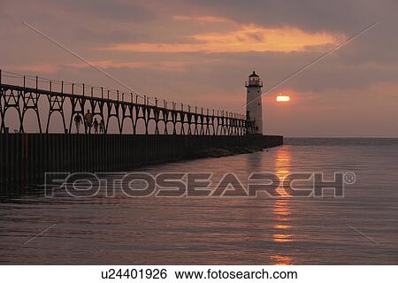 Manistee, MI, Michigan, Lake Michigan, North Pierhead Lighthouse, sunset View Large Photo Image Stock Photograph - Manistee, MI, Michigan, Lake Michigan, North Pierhead Lighthouse, sunset. Fotosearch