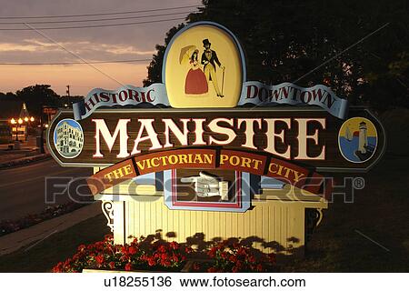 Manistee, MI, Michigan, River Street, Historic Downtown, evening, welcome sign View Large Photo Image Stock Photograph - Manistee, MI, Michigan, River Street, Historic Downtown, evening, welcome sign. Fotosearch