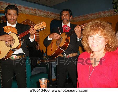 Mariachi Band, Mexican Restaurant, entertain woman, Galax, Virginia, VA View Large Photo Image Stock Photograph - Mariachi Band, Mexican Restaurant, entertain woman, Galax, Virginia, VA. Fotosearch