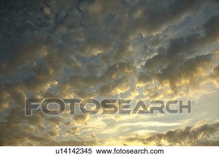 Stock Photography -  MI, Michigan, Upper Peninsula, Lake Superior, cloud formations, sky. Fotosearch