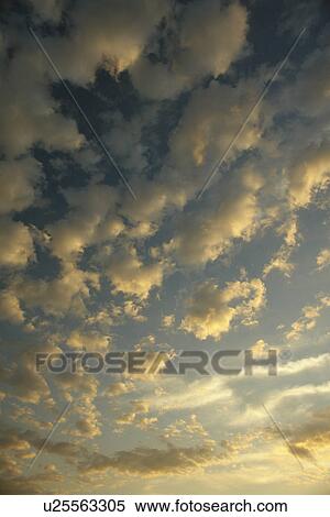 Stock Photography -  MI, Michigan, Upper Peninsula, Lake Superior, cloud formations, sky. Fotosearch