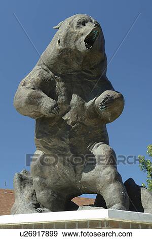 Stock Photo -  Missoula, MT, Montana, University of Montana, Grizzly Bear Statue. Fotosearch