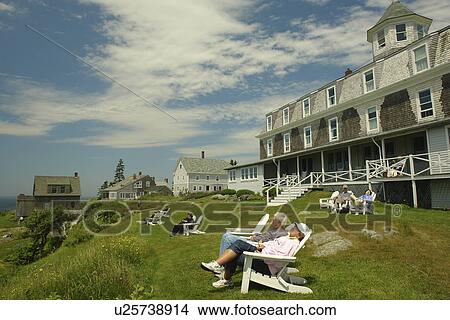 Monhegan Island, ME, Maine, Monhegan Inn, people relaxing in chairs View Large Photo Image Picture - Monhegan Island, ME, Maine, Monhegan Inn, people relaxing in chairs. Fotosearch