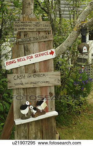Stock Photography -  Monhegan Island, ME, Maine, wood sculptures, puffins. Fotosearch