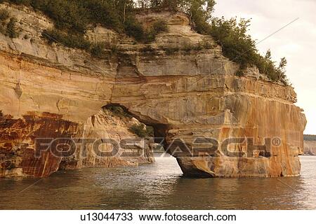 Munsing, MI, Michigan, Upper Peninsula, Lake Superior, Pictured Rocks Boat Cruise, Pictured Rocks National Lakeshore, sunset View Large Photo Image Stock Image - Munsing, MI, Michigan, Upper Peninsula, Lake Superior, Pictured Rocks Boat Cruise, Pictured Rocks National Lakeshore, sunset. Fotosearch