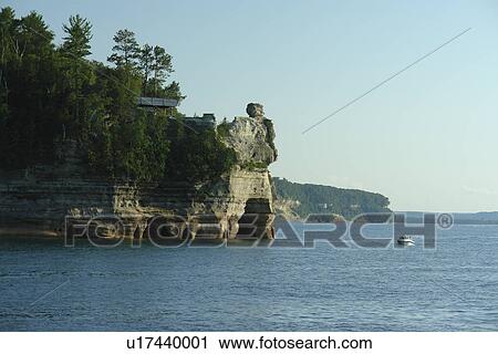 Stock Image -  Munsing, MI, Michigan, Upper Peninsula, Lake Superior, Pictured Rocks Boat Cruise, Pictured Rocks National Lakeshore, Miners Castle Overlook. Fotosearch