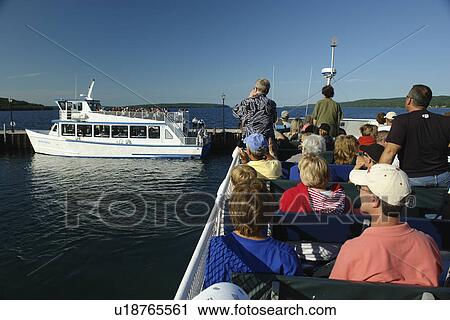 Munsing, MI, Michigan, Upper Peninsula, Lake Superior, Pictured Rocks Boat Cruise, passengers, open deck View Large Photo Image Stock Image - Munsing, MI, Michigan, Upper Peninsula, Lake Superior, Pictured Rocks Boat Cruise, passengers, open deck. Fotosearch