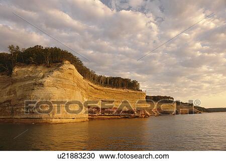 Munsing, MI, Michigan, Upper Peninsula, Lake Superior, Pictured Rocks Boat Cruise, Pictured Rocks National Lakeshore, sunset View Large Photo Image Stock Image - Munsing, MI, Michigan, Upper Peninsula, Lake Superior, Pictured Rocks Boat Cruise, Pictured Rocks National Lakeshore, sunset. Fotosearch