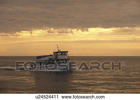 Munsing, MI, Michigan, Upper Peninsula, Lake Superior, Pictured Rocks Boat Cruise, Pictured Rocks National Lakeshore, sunset View Large Photo Image Stock Image - Munsing, MI, Michigan, Upper Peninsula, Lake Superior, Pictured Rocks Boat Cruise, Pictured Rocks National Lakeshore, sunset. Fotosearch
