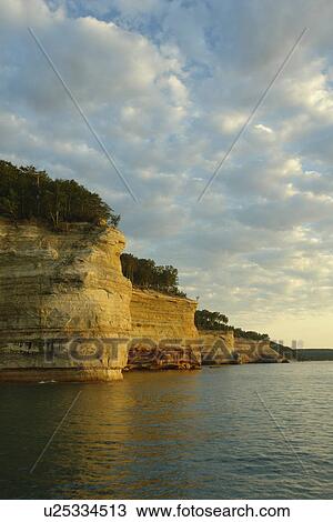 Munsing, MI, Michigan, Upper Peninsula, Lake Superior, Pictured Rocks Boat Cruise, Pictured Rocks National Lakeshore, sunset View Large Photo Image Stock Image - Munsing, MI, Michigan, Upper Peninsula, Lake Superior, Pictured Rocks Boat Cruise, Pictured Rocks National Lakeshore, sunset. Fotosearch