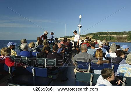Munsing, MI, Michigan, Upper Peninsula, Lake Superior, Pictured Rocks Boat Cruise, Pictured Rocks National Lakeshore, passengers, open deck View Large Photo Image Stock Image - Munsing, MI, Michigan, Upper Peninsula, Lake Superior, Pictured Rocks Boat Cruise, Pictured Rocks National Lakeshore, passengers, open deck. Fotosearch