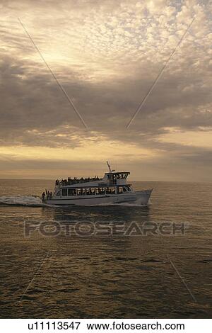 Munsing, MI, Michigan, Upper Peninsula, Lake Superior, Pictured Rocks Boat Cruise, Pictured Rocks National Lakeshore, sunset View Large Photo Image Stock Photo - Munsing, MI, Michigan, Upper Peninsula, Lake Superior, Pictured Rocks Boat Cruise, Pictured Rocks National Lakeshore, sunset. Fotosearch