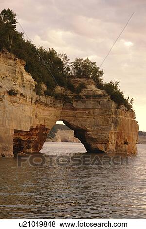 Munsing, MI, Michigan, Upper Peninsula, Lake Superior, Pictured Rocks Boat Cruise, Pictured Rocks National Lakeshore, sunset View Large Photo Image Stock Photo - Munsing, MI, Michigan, Upper Peninsula, Lake Superior, Pictured Rocks Boat Cruise, Pictured Rocks National Lakeshore, sunset. Fotosearch