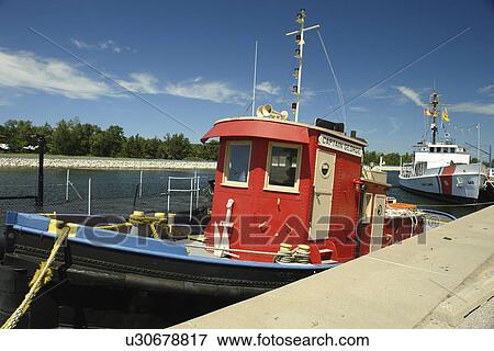 Muskegon, MI, Michigan, Lake Michigan, Great Lakes Naval Memorial and Museum, tug boat View Large Photo Image Stock Photo - Muskegon, MI, Michigan, Lake Michigan, Great Lakes Naval Memorial and Museum, tug boat. Fotosearch