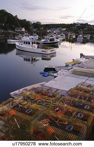 Stock Photo -  New Harbor, ME, Maine, Pemaquid Peninsula, fishing harbor, evening. Fotosearch