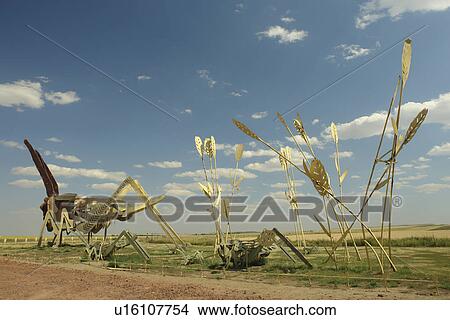 Picture -  Regent, ND, North Dakota, The Enchanted Highway, World's Largest Scrap Metal Sculptures, Grasshoppers in Field. Fotosearch