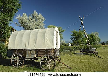 Ronan, MT, Montana, Flathead Indian Reservation, Mission Valley, Ninepipes Museum of Early Montana, covered wagon View Large Photo Image Stock Photo - Ronan, MT, Montana, Flathead Indian Reservation, Mission Valley, Ninepipes Museum of Early Montana, covered wagon. Fotosearch
