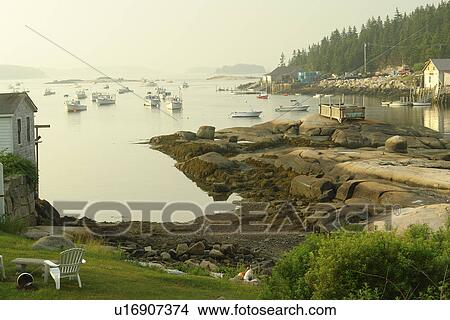 Stonington, ME, Maine, Deer Isle, fishing harbor, low tide View Large Photo Image Picture - Stonington, ME, Maine, Deer Isle, fishing harbor, low tide. Fotosearch