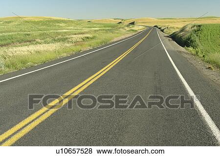 Stock Photo -  The Palouse Country, WA, Washington, Whitman County, rolling hills, scenic drive, road. Fotosearch