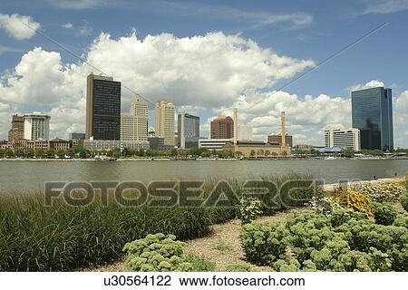 Stock Image -  Toledo, OH, Ohio, Downtown Skyline, Maumee River, International Park. Fotosearch