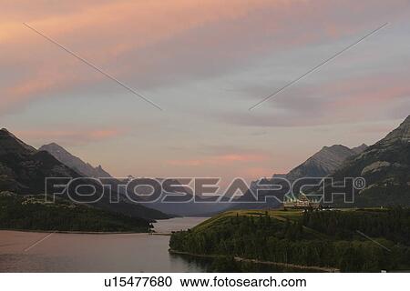 Waterton Lakes National Park, Alberta, Canada, Rocky Mountains, Prince of Wales Hotel, Upper and Middle Waterton Lakes, sunrise View Large Photo Image Stock Image - Waterton Lakes National Park, Alberta, Canada, Rocky Mountains, Prince of Wales Hotel, Upper and Middle Waterton Lakes, sunrise. Fotosearch