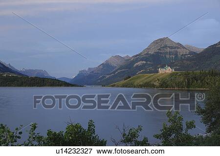 Waterton Lakes National Park, Alberta, Canada, Rocky Mountains, Upper and Middle Waterton Lakes, sunrise View Large Photo Image Stock Photo - Waterton Lakes National Park, Alberta, Canada, Rocky Mountains, Upper and Middle Waterton Lakes, sunrise. Fotosearch