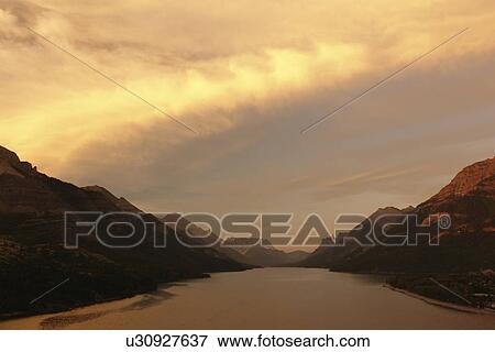 Waterton Lakes National Park, Alberta, Canada, Rocky Mountains, Prince of Wales Hotel, Upper and Middle Waterton Lakes, sunrise View Large Photo Image Stock Photo - Waterton Lakes National Park, Alberta, Canada, Rocky Mountains, Prince of Wales Hotel, Upper and Middle Waterton Lakes, sunrise. Fotosearch