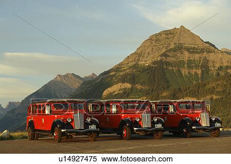 Waterton Lakes National Park, Alberta, Canada, Rocky Mountains, Prince of Wales Hotel, Upper and Middle Waterton Lakes, red jammer tour buses View Large Photo Image Stock Photography - Waterton Lakes National Park, Alberta, Canada, Rocky Mountains, Prince of Wales Hotel, Upper and Middle Waterton Lakes, red jammer tour buses. Fotosearch
