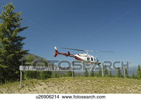 Picture -  West Glacier, MT, Montana, Great Northern Resort, Glacier Heli Rides, helicopter. Fotosearch