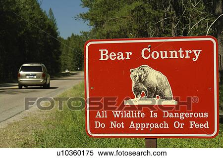West Glacier, MT, Montana, Rocky Mountains, Glacier National Park, West Entrance, Entering Bear Country sign View Large Photo Image Stock Photography - West Glacier, MT, Montana, Rocky Mountains, Glacier National Park, West Entrance, Entering Bear Country sign. Fotosearch