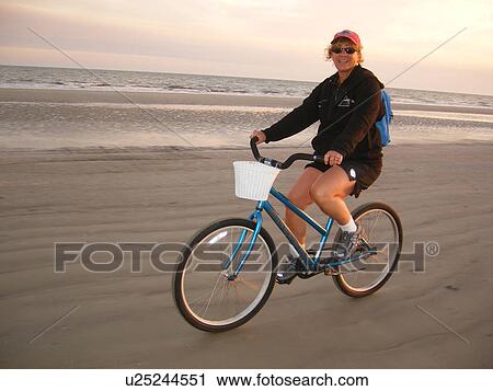 woman biking on the beach, Hilton Head Island, Low Country, South Carolina, SC, Atlantic Ocean View Large Photo Image Stock Image - woman biking on the beach, Hilton Head Island, Low Country, South Carolina, SC, Atlantic Ocean. Fotosearch