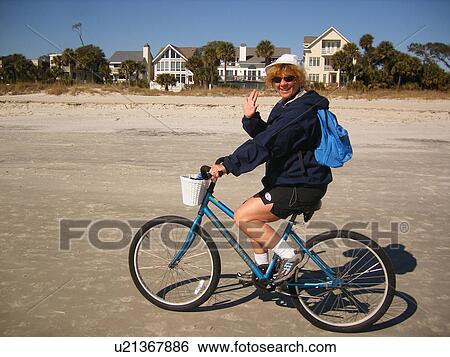 woman biking on the beach, Hilton Head Island, Low Country, South Carolina, SC, Atlantic Ocean View Large Photo Image Stock Photograph - woman biking on the beach, Hilton Head Island, Low Country, South Carolina, SC, Atlantic Ocean. Fotosearch