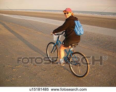 woman biking on the beach, Hilton Head Island, Low Country, South Carolina, SC, Atlantic Ocean View Large Photo Image Stock Photography - woman biking on the beach, Hilton Head Island, Low Country, South Carolina, SC, Atlantic Ocean. Fotosearch