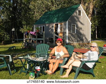 women, sitting, chairs, summer cottage, St Albans, VT, Vermont, Lake Champlain View Large Photo Image Stock Image - women, sitting, chairs, summer cottage, St Albans, VT, Vermont, Lake Champlain. Fotosearch