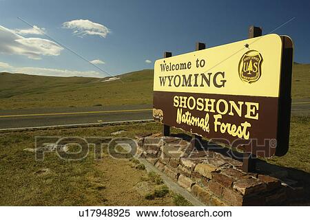 Stock Photography -  WY, Wyoming, Beartooth Scenic Highway, Beartooth All American Road, Welcome to Wyoming, entering Shoshone National Forest, road sign. Fotosearch