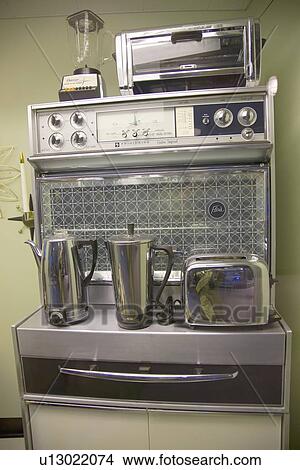 Picture - 1960's stove and coffee pots at at John F. Kennedy Presidential Library and Museum, Boston, MA.. Fotosearch