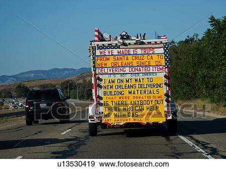 A truck with trailer promoting "Peace" and "New Orleans hurricane" View Large Photo Image Stock Photo - A truck with trailer promoting "Peace" and "New Orleans hurricane". Fotosearch