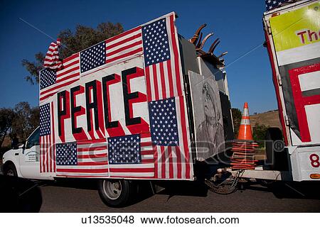 A truck with trailer promoting "Peace" and "New Orleans hurricane" View Large Photo Image Stock Photo - A truck with trailer promoting "Peace" and "New Orleans hurricane". Fotosearch