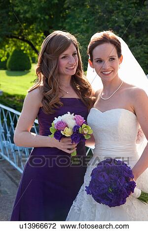 Stock Image - Bride and bridesmade in Public Gardens, Boston, MA. Fotosearch