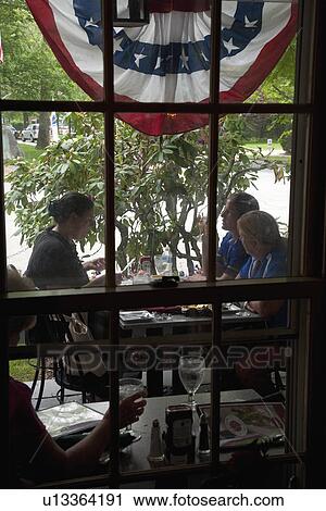 Stock Image - Lunching in Concord's Colonial Inn, MA. Fotosearch