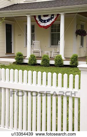 Stock Photo - White picket fence in Concord MA. Fotosearch